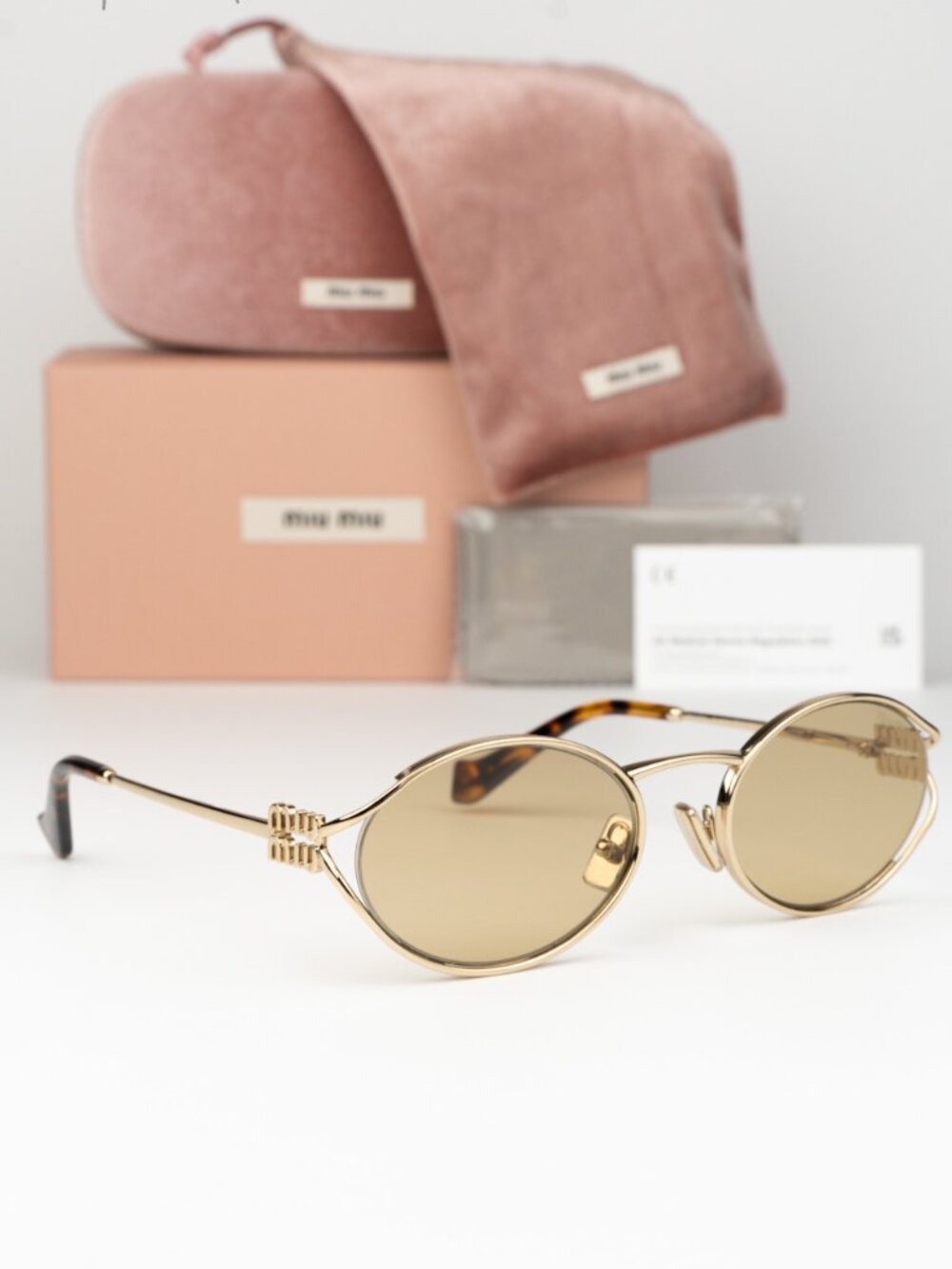 Miu Miu Women Sunglasses LOGO Pale Gold Yellow Oval MU52YS ZVN10R NEW AUTHENTIC